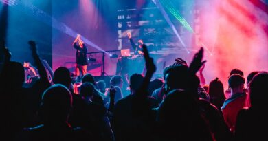 woman singing on stage