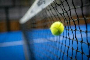 a tennis ball in a net
